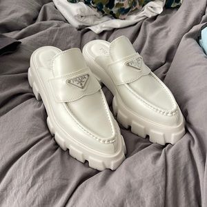 Trendy white slip ons